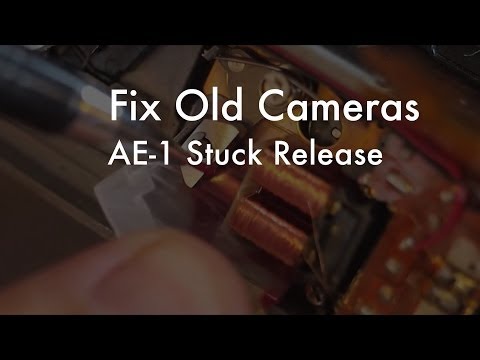 how to open a canon av-1 camera