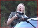 Blond Girl Blowing Up 5 Gallons OF Gas With A Big Gun! BOOM!