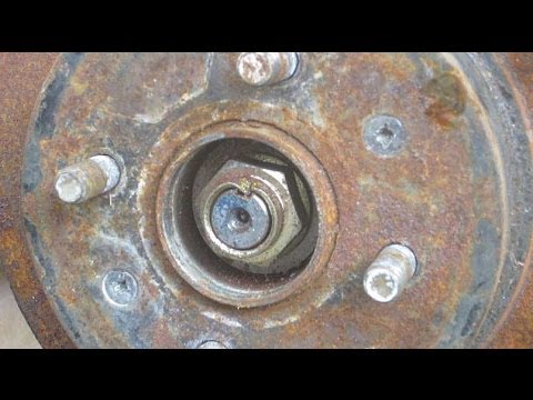 how to remove drive axle hub nut