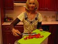 In this video, Betty demonstrates how to make a nutritious, diet-conscious Colorful Chickpea Salad. This salad has chickpeas (garbanzo beans), English cucumber, green bell pepper, red bell pepper, cherry tomato halves, cilantro and some spices, and is drizzled with lighter flavor olive oil. It is colorful and appealing, and you can have quite a large serving without spoiling your New Year's diet! Ingredients: 16 oz. can chick peas (garbanzo beans), drained, rinsed, and dried with a paper towel 1/2 English cucumber, sliced in half-slices (You may use a regular cucumber, if you prefer.) 1/2 green bell pepper, chopped 1/2 red bell pepper, chopped 1/2 of a 10-oz. container of grape tomatoes, halved (You may use cherry tomatoes.) 1/4 cup chopped cilantro 1/2 teaspoon garlic powder 1/2 teaspoon seasoned pepper (You may use freshly ground black pepper.) 1/4 teaspoon salt 1/4 cup lighter flavor olive oil Drain and rinse a 16-oz. can of chick peas, Pat dry with a paper towel. Place into a large mixing (or serving) bowl. Add 1/2 of and English cucumber, sliced into half-slices, 1/2 chopped green bell pepper, 1/2 chopped red bell pepper, 1/2 of a 10-oz. container of halved grape tomatoes, and 1/4 cup chopped cilantro. Stir to combine. Sprinkle 1/2 teaspoon garlic powder, 1/2 teaspoon seasoned pepper, and 1/4 teaspoon salt over the top. Stir again, to combine flavors. Drizzle about 1/4 cup lighter flavor olive oil over the top, and fold it into the salad. You may serve this salad <b>...</b>