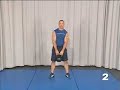 Steve Cotter performs a two hand flip and catch rear
