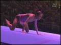The dancer is Irina Tchachina from Russia. She's a former rhythmic gymnast who took the silver medal in the 2004 Olympics. Her technique is superb and more dancers today needs to see this to actually see what great technical dancing looks like.  For example, when she does her jump splits she does oversplits and has amazing height on them.