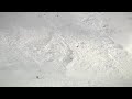 www.videobash.com Pro snowboarder Meesh Hytner survives a scary avalanche while participating in an informal backcountry competition in Colorado. Luckily she was wearing a safety air bag.