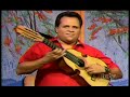 Trovador Gùiso Hernandez del pueblo de Orocovis, Puerto Rico interpreta una decima puertorriqueña en un Seis del Llano. Acompañado por el excelente cuatrista, Juradito y su Grupo. Show ASI Canta Puerto Rico, producido por Luisito Vigoreaux