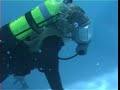 Susirubber scuba diving in an Interspiro full face mask