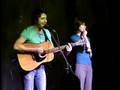 Jian Ghomeshi of CBC playing guitar
