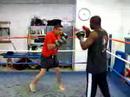 Peter \"Sugarfoot\" Cunningham holding mitts for Glen