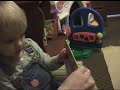 madison reads a favorite book to her brother.