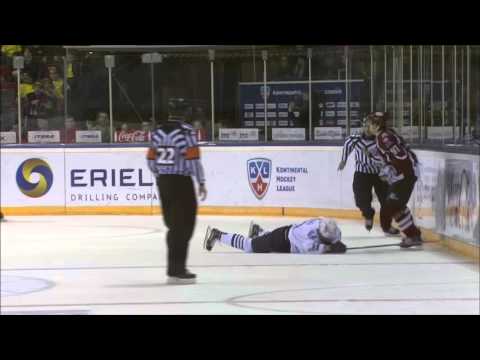 Kristaps Zile levels Alexander Kuznetsov in his first KHL game