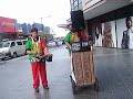 COLORFUL FAT MAN DETICATES SONG TO US.
