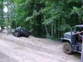 Winching M35 with another M35 out of mudhole