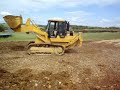 chargeur sur chenille caterpillar 963 au travail