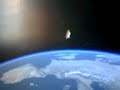 cohete en el espacio