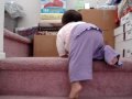 Avery climbing up the stairs