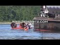 A tug boat pulling a barge at Skookumchuck Narrows suddenly capsizes trapping one man inside the boat for 10 minutes. Kayaker Dave Fusilli of Team Demshitz www.demshitz.com paddles out his Pyranha kayak http in an attempt to save the man from the wreckage. Luckily no one was killed and a nearby tug pulled the barge and submerged tug to safety before the tide went out and the rapids of Skookumchuck became dangerous. here is a vid of demshitz surfing skook www.youtube.com