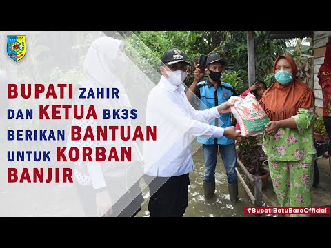 Bupati Batu Bara Bersama Ketua BK3S Memberikan Bantuan Kepada Korban Banjir