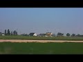 Crop duster flying low over freeway