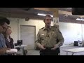 More at http://www.theuptake.org. After the site and interior of the secret detention center in Denver, developed in anticipation of the DNC, was exposed, the Sheriff's Office decided they may as well give the media a tour to reassure public sentiment. Undersheriff Bill Lovingier showed TV, newspaper, radio, and new media around the facility, walking through the process a detainee would face.

One change made to the facility because of the media coverage and resulting community outrage is the removal of razor wire on the interior holding pens.




Lovingier explains the change and why the extra security is needed within the facility not just to prevent people from escaping, but also to prevent protest and counter-protest groups from clashing violently while being held.

The ACLU has raised a concern about the process, saying Colorado law requires lawyers to meet with their clients within the detention center. Lovingier sidestepped a question about this, saying only 