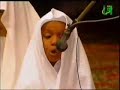 young boy reciting quran