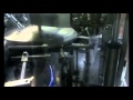 Ensacheuse automatique pour sachets avec ou sans bouchons pour produits secs .wmv