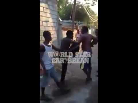 Fight In Jamaica Yute Get Jump and Some Rass Licks in His Ass
