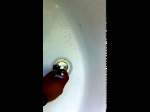 how to remove a pop up drain