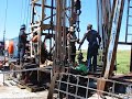 Workover Rig Runnings Rods Back In Oil Well Bryan Texas 2008