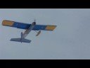 R/C Electric LT-25e Flying from snow with skis.