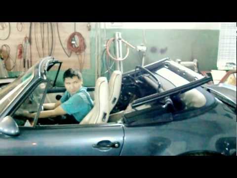 Porsche 911 Carrera Cabrio. Opening the roof after the repair.