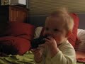Emi chewing on shoe, asking for dad... clearly. Emi chewing on shoe, asking for dad... clearly.