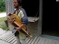 Hurdy Gurdy player in Archeon, historic theme park Hurdy Gurdy player in Archeon, historic theme park