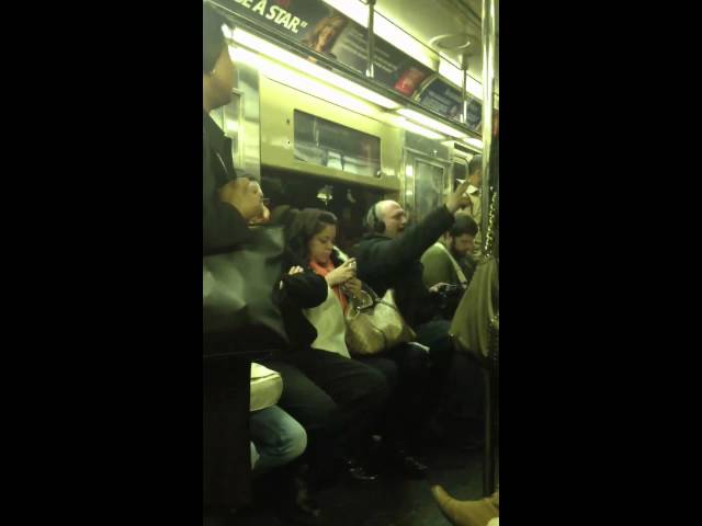 Drunk Guy Belts Out Bohemian Rhapsody on Train
