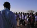 Burkina Faso, Sahel, Province of Oudalan - Students from Gorom Gorom and Gagara villages have a lesson on desertification right at field in Siloubè, where 'DesertoVerde' (.ch) has worked 200 hectares.
