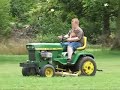 Mowing Grass with a JD 140