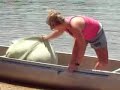 Counselors learn how to transfer campers to a canoe Counselors learn how to transfer campers to a canoe