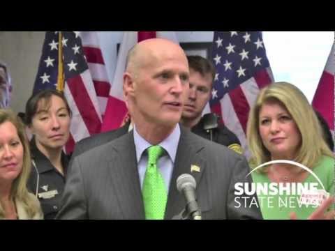 Gov. Rick Scott and CFO Jeff Atwater urge lawmakers to take action against motor vehicle insurance fraud during a Jan. 25, 2012, rally in the Capitol. Courtesy: Dave Heller Video
