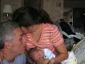 A father, mother (Julie N. Ricketts), and son