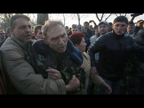 Where - Outside an airbase in Kramatorsk in Eastern Ukraine, pro-Russian demonstrators swarmed and roughed-up a Ukrainian general who came out to talk to them after ...