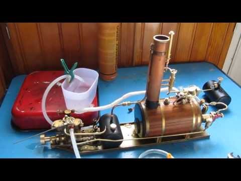 moteur vapeur - Mise en route d'une machine Puffin de chez Cheddar (bi cylindres oscillant de 4 cm3 environ) associée à une pompe à eau originale. Objectif, doubler l'autono...