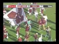 Mississippi State's Sylvester Croom runs with the flag