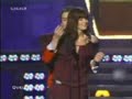a comedian squeezez sandra boobs at an award function