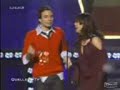a comedian squeezez sandra boobs at an award function