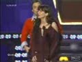a comedian squeezez sandra boobs at an award function
