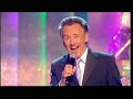 tony christie singing one of his hit singles, is this the way to amarillo on bbc program, saturday swings.