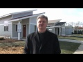 Explanation of water saving, bathroom plumbing fixtures in 2010 GreenBuild Habitat for Humanity home