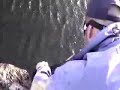 Pike bites mans hand Pike bites mans hand
