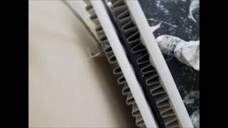 Video showing how to paint behind radiators