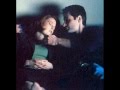 Mulder and scully take a picture
