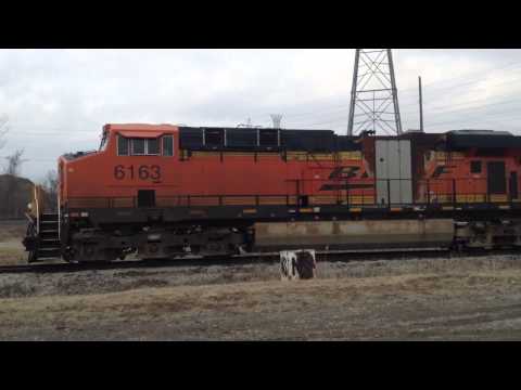 ES44AC - BNSF ES44AC 6163 startup. SD70MAC 9942 remained off while 6163 (with an apparent recent engine fire) started (what I am assuming is on a timer) in Trenton, M...
