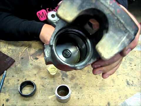 how to rebuild caliper piston